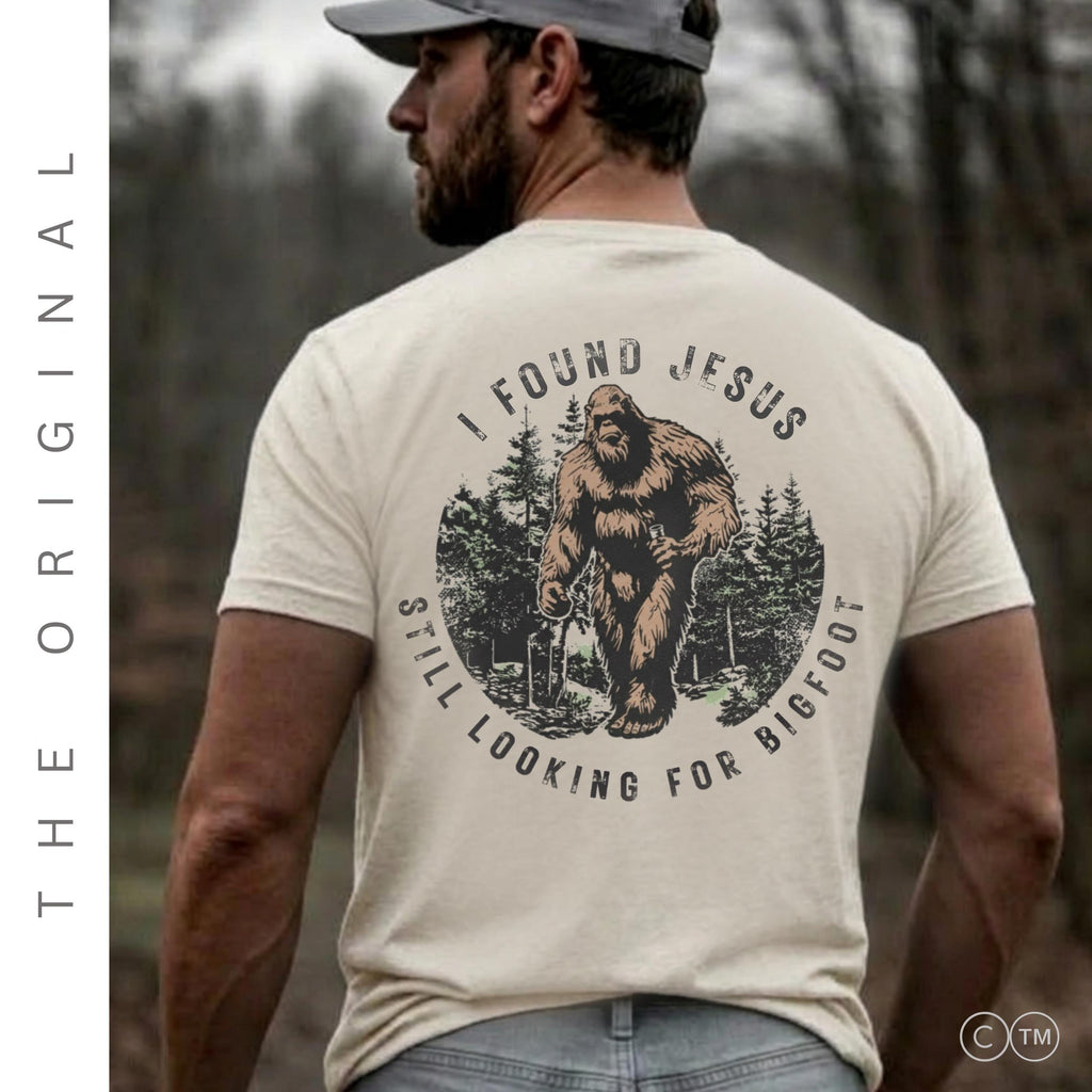 I Found Jesus Still Looking For Bigfoot™ Funny Christian Shirt | Christian T-Shirt Men